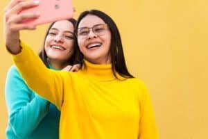 Young women taking selfie